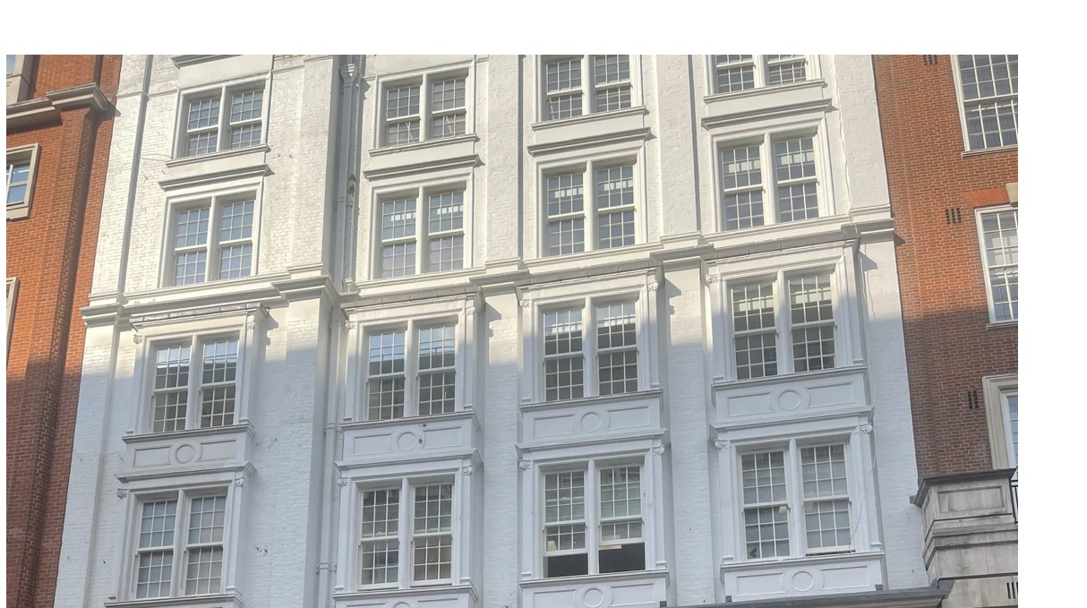 The facade of a large multi-storey building in London